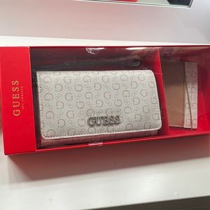 Guess wristlet NWT; never opened